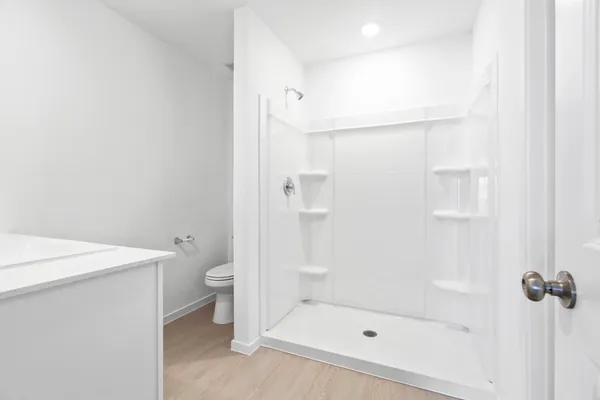 an aerial view of residential building with ocean view