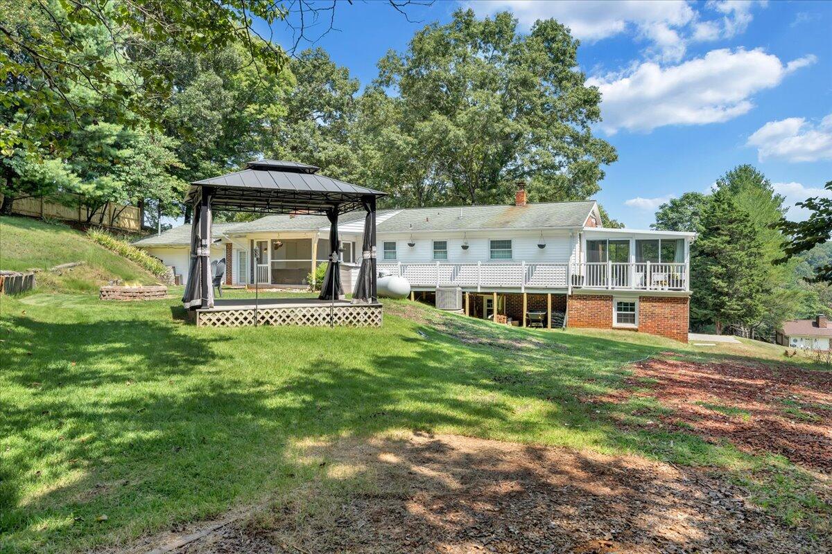 240 Lakeshore Terrace Road Hardy, VA 24101 - Photo 45 of 102 a front view of a house with a yard