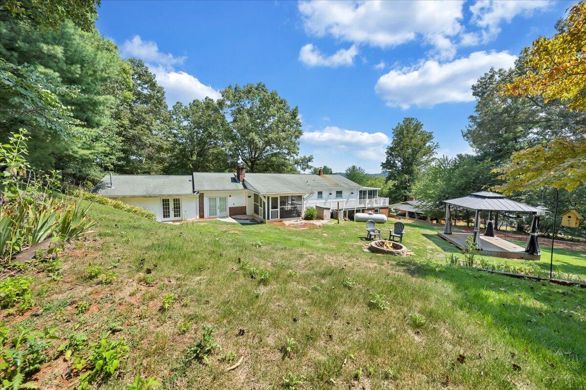 240 Lakeshore Terrace Road Hardy, VA 24101 - Photo 52 of 102 a swimming pool with outdoor seating and yard