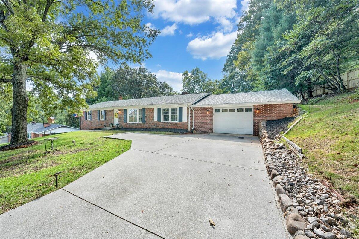 240 Lakeshore Terrace Road Hardy, VA 24101 - Photo 70 of 102 a front view of a house with garden