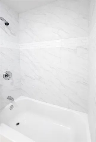 a bathroom with a bathtub