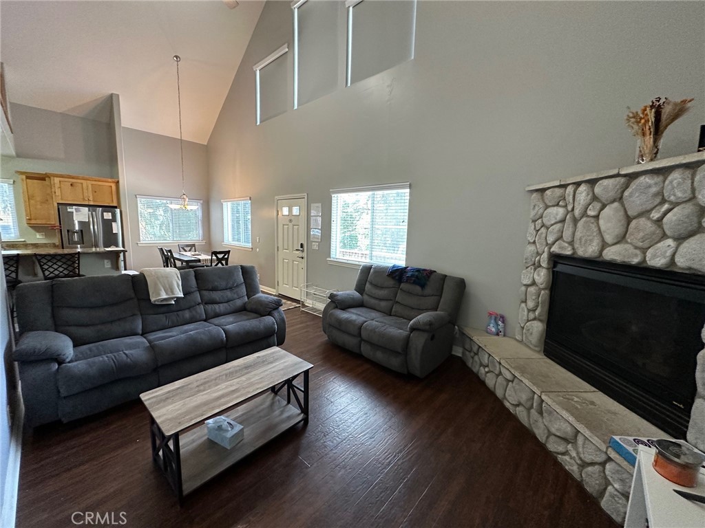 2551 Rim Of The World Drive Running Springs, CA 92382 - Photo 13 of 43 Cozy living room with a stone fireplace