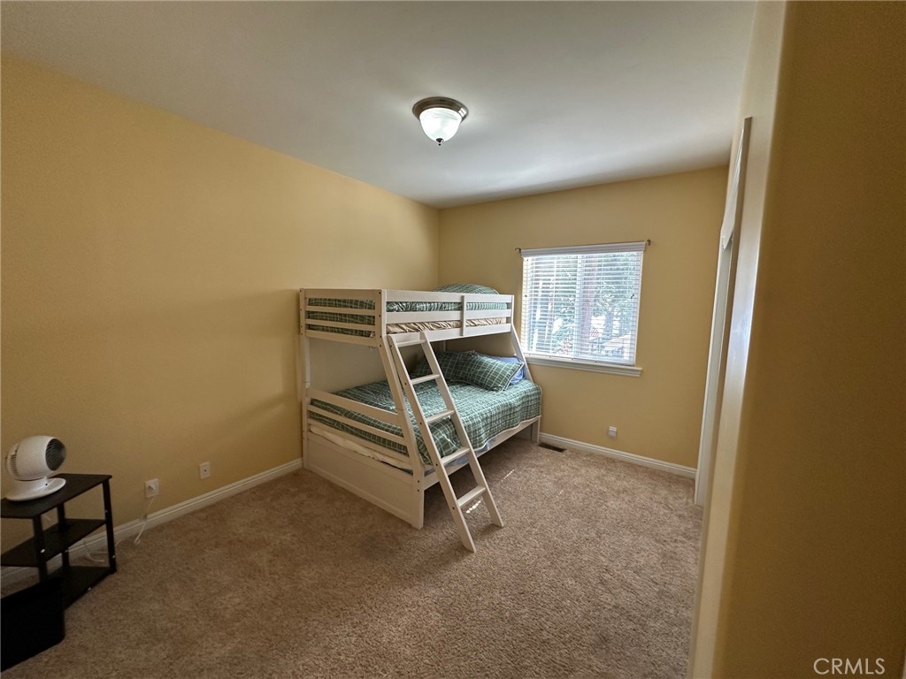 2551 Rim Of The World Drive Running Springs, CA 92382 - Photo 18 of 43 Downstairs secondary bedroom