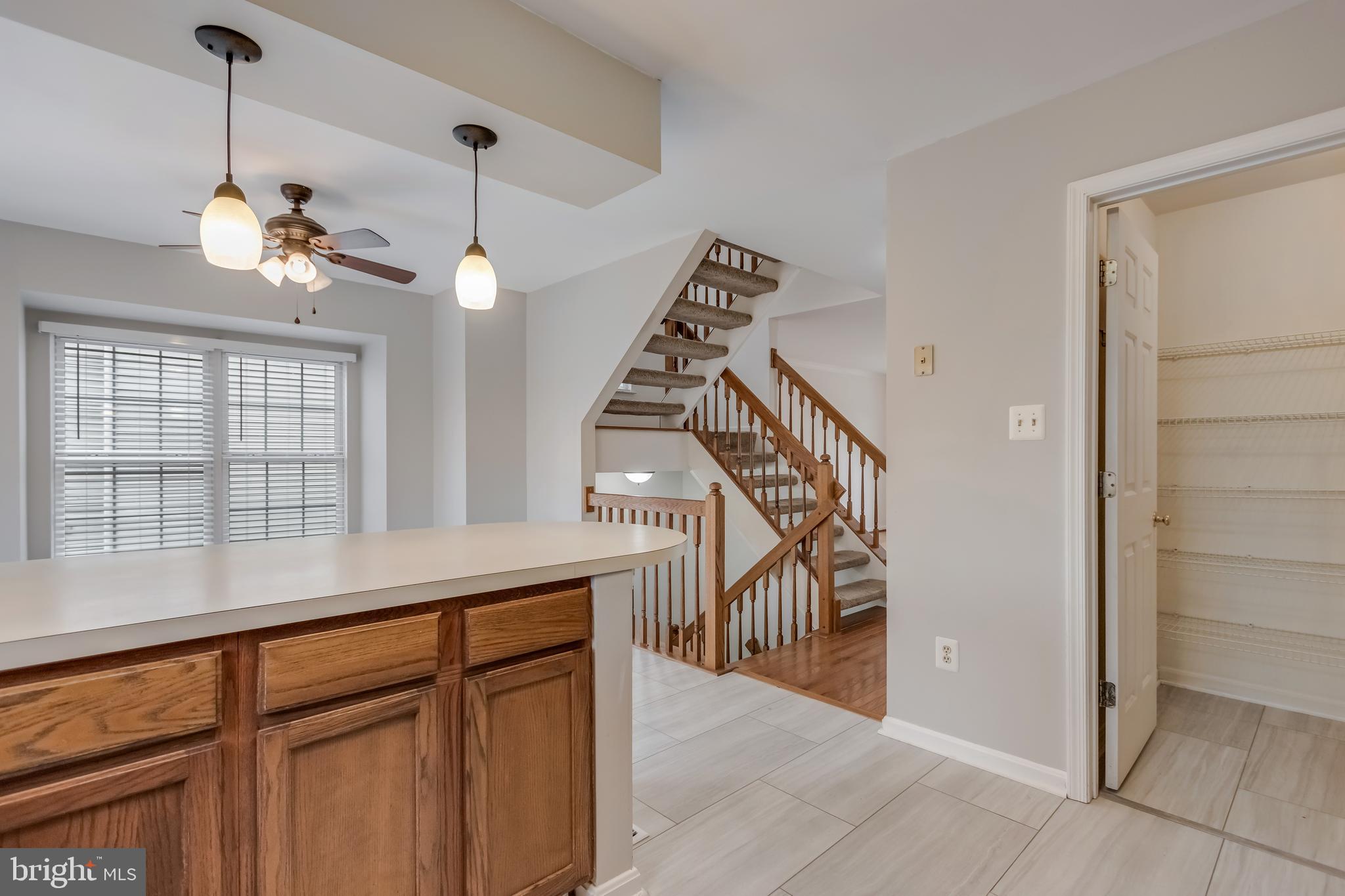 45550 Whitcomb Square Sterling, VA 20166 - Photo 4 of 24 a view of a hallway with a chandelier and chandelier