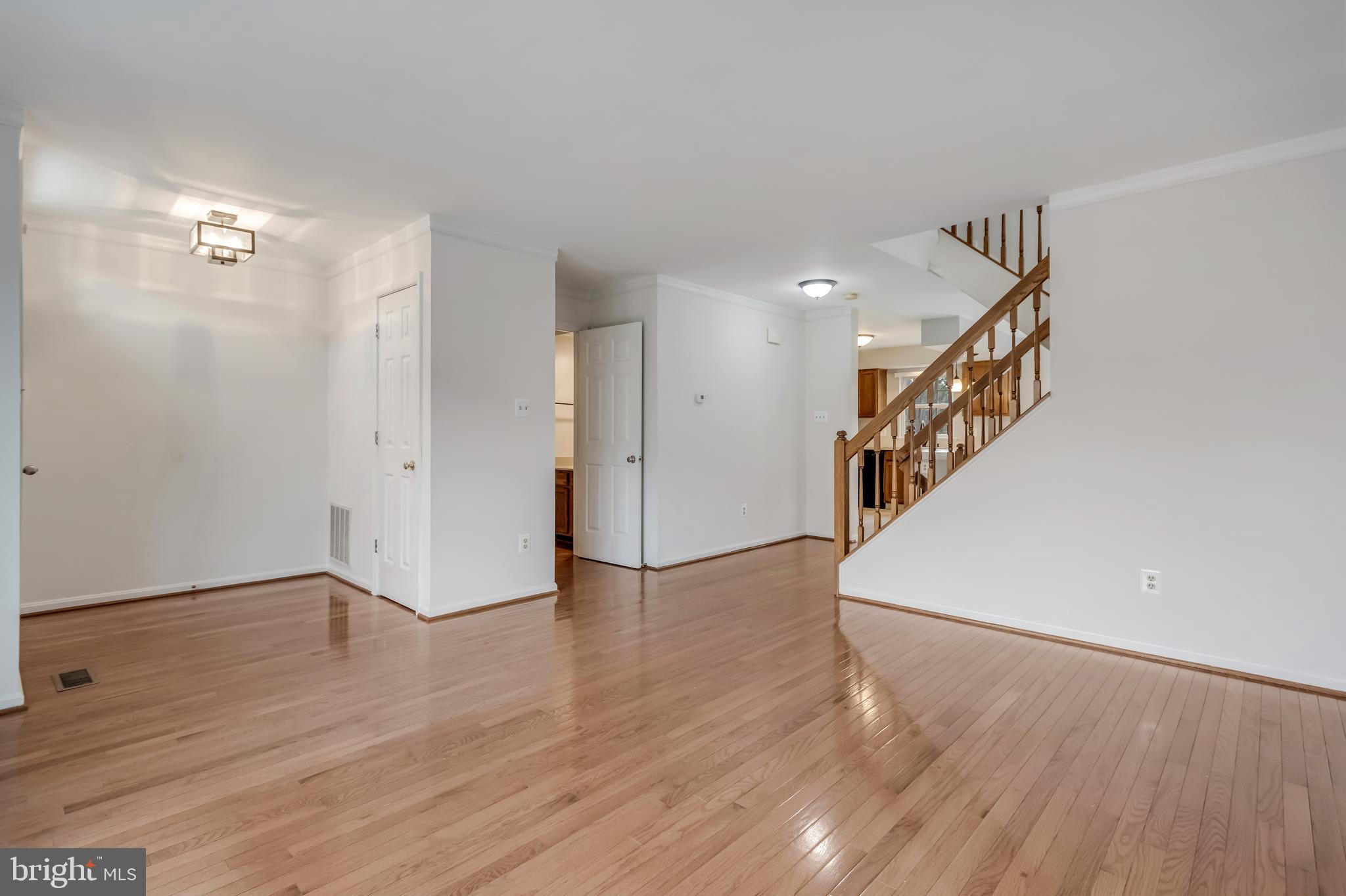 45550 Whitcomb Square Sterling, VA 20166 - Photo 8 of 24 a view of an entryway with wooden floor