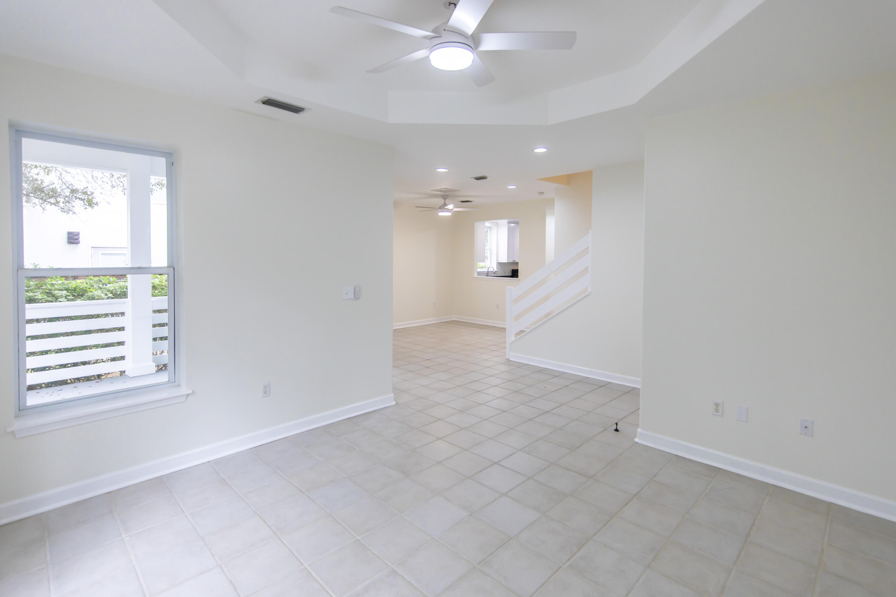 51 Loon Lake Drive Santa Rosa Beach, FL 32459 - Photo 23 of 49 an empty room with windows and fan