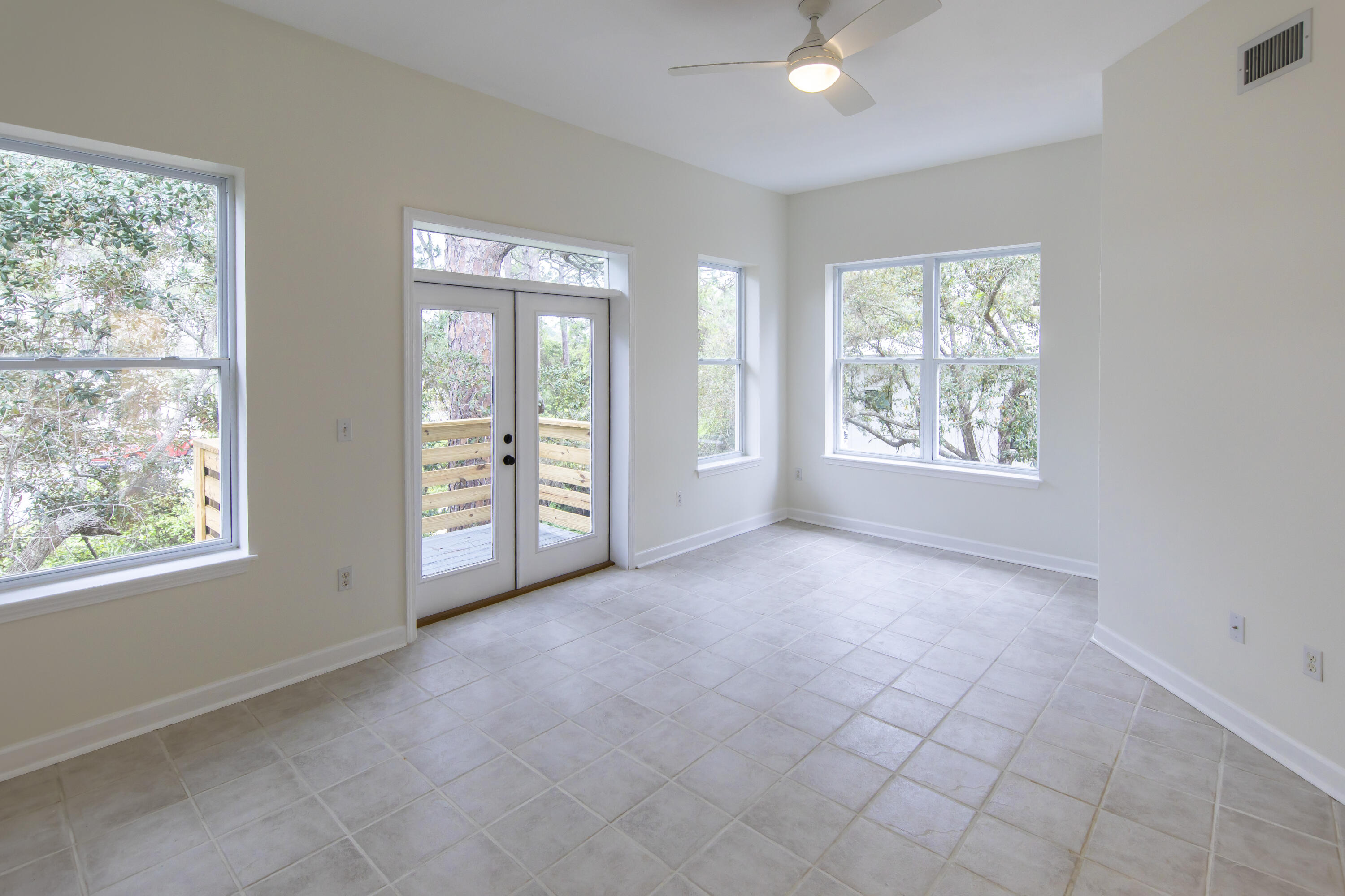 51 Loon Lake Drive Santa Rosa Beach, FL 32459 - Photo 26 of 49 a view of an empty room with windows and closet