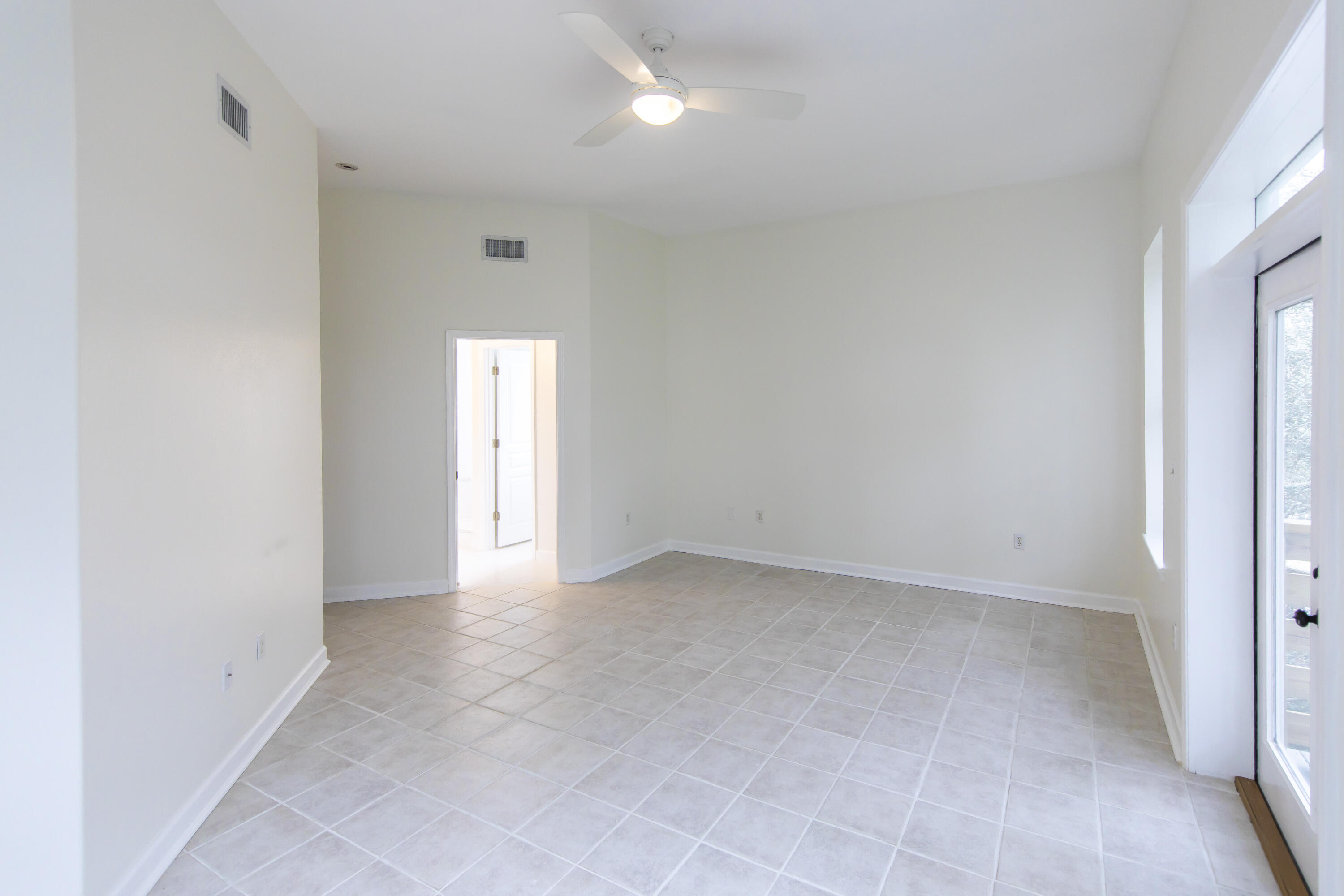 51 Loon Lake Drive Santa Rosa Beach, FL 32459 - Photo 27 of 49 an empty room with windows and closet