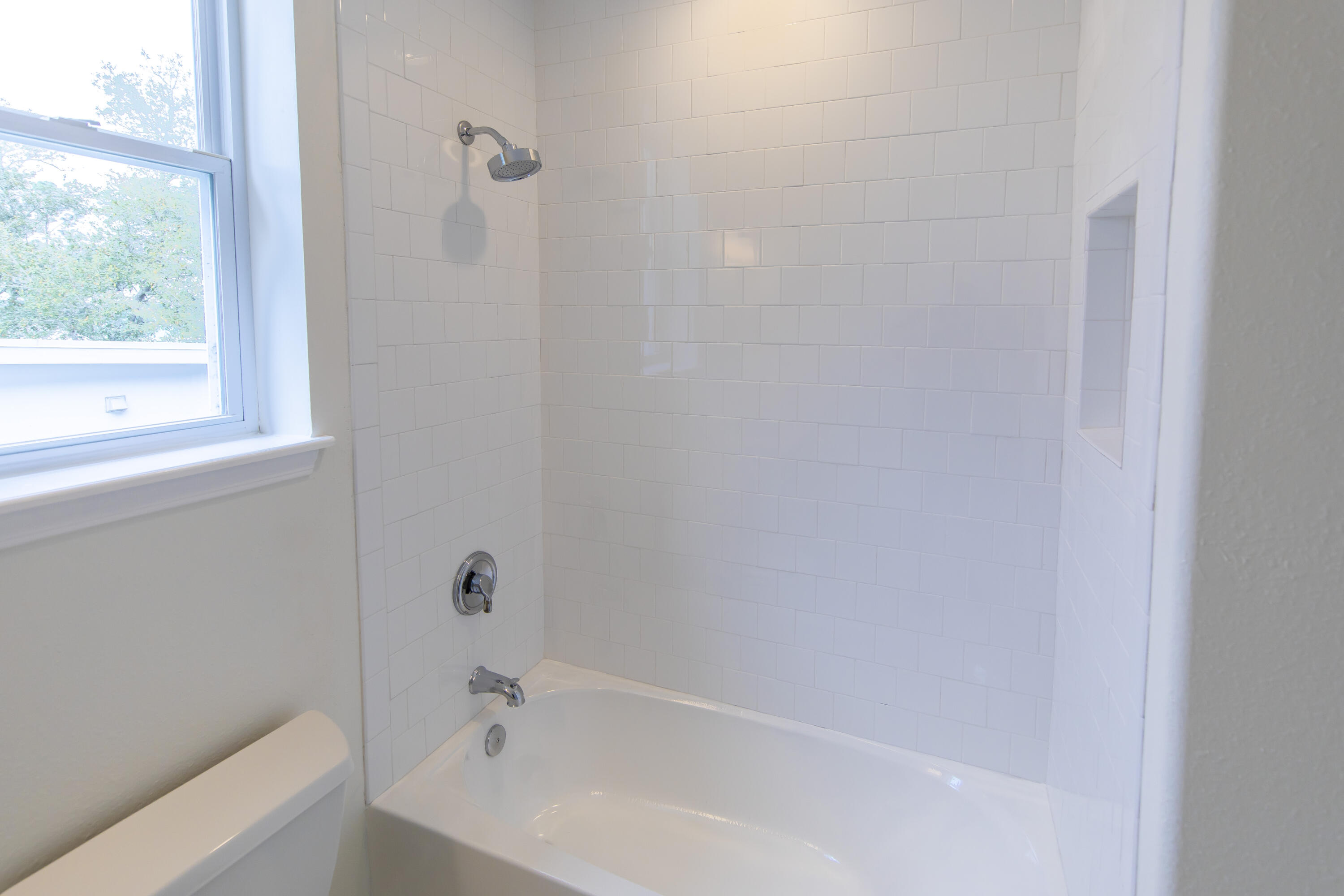 51 Loon Lake Drive Santa Rosa Beach, FL 32459 - Photo 33 of 49 a white bath tub sitting next to a shower