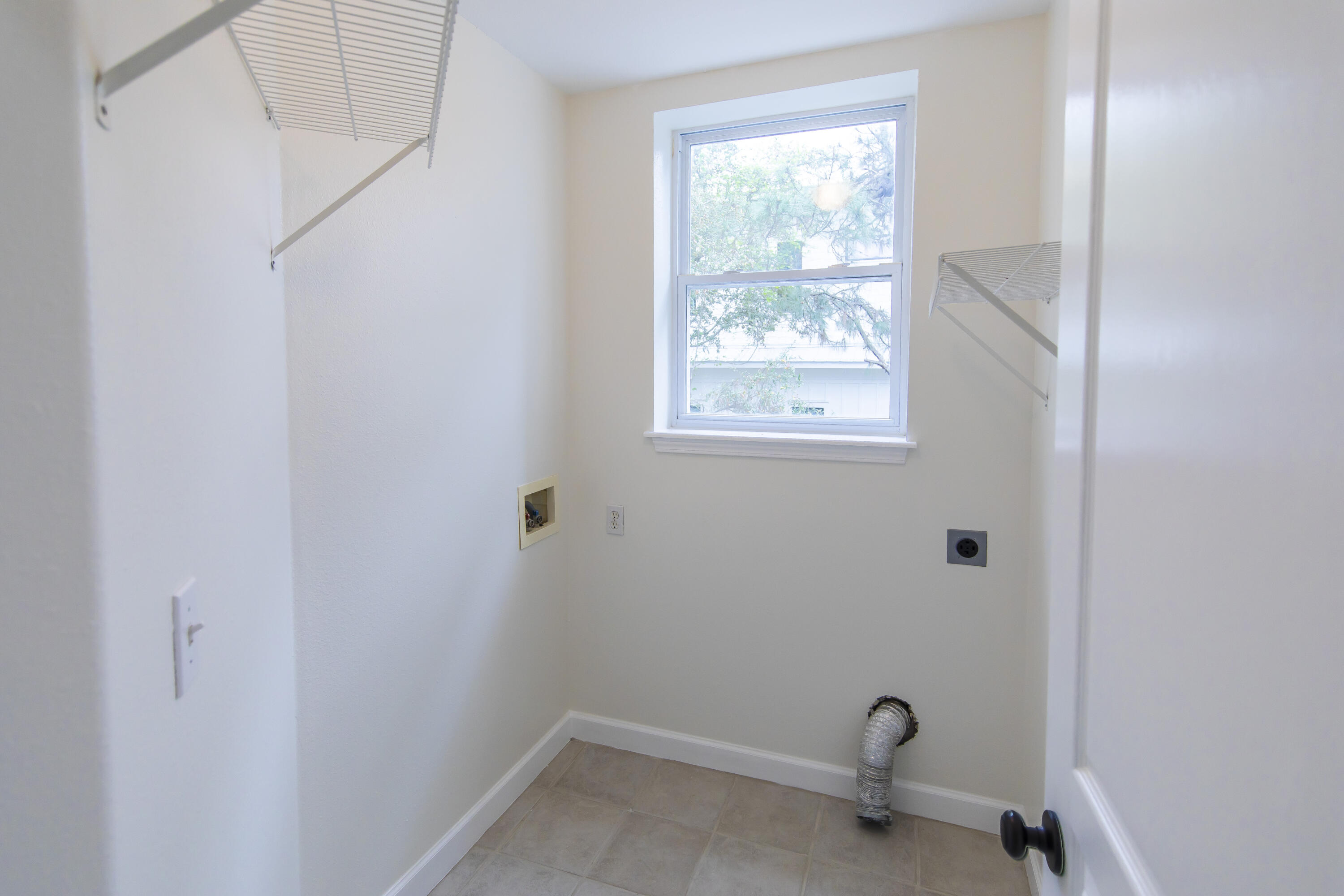 51 Loon Lake Drive Santa Rosa Beach, FL 32459 - Photo 37 of 49 a bathroom with a window