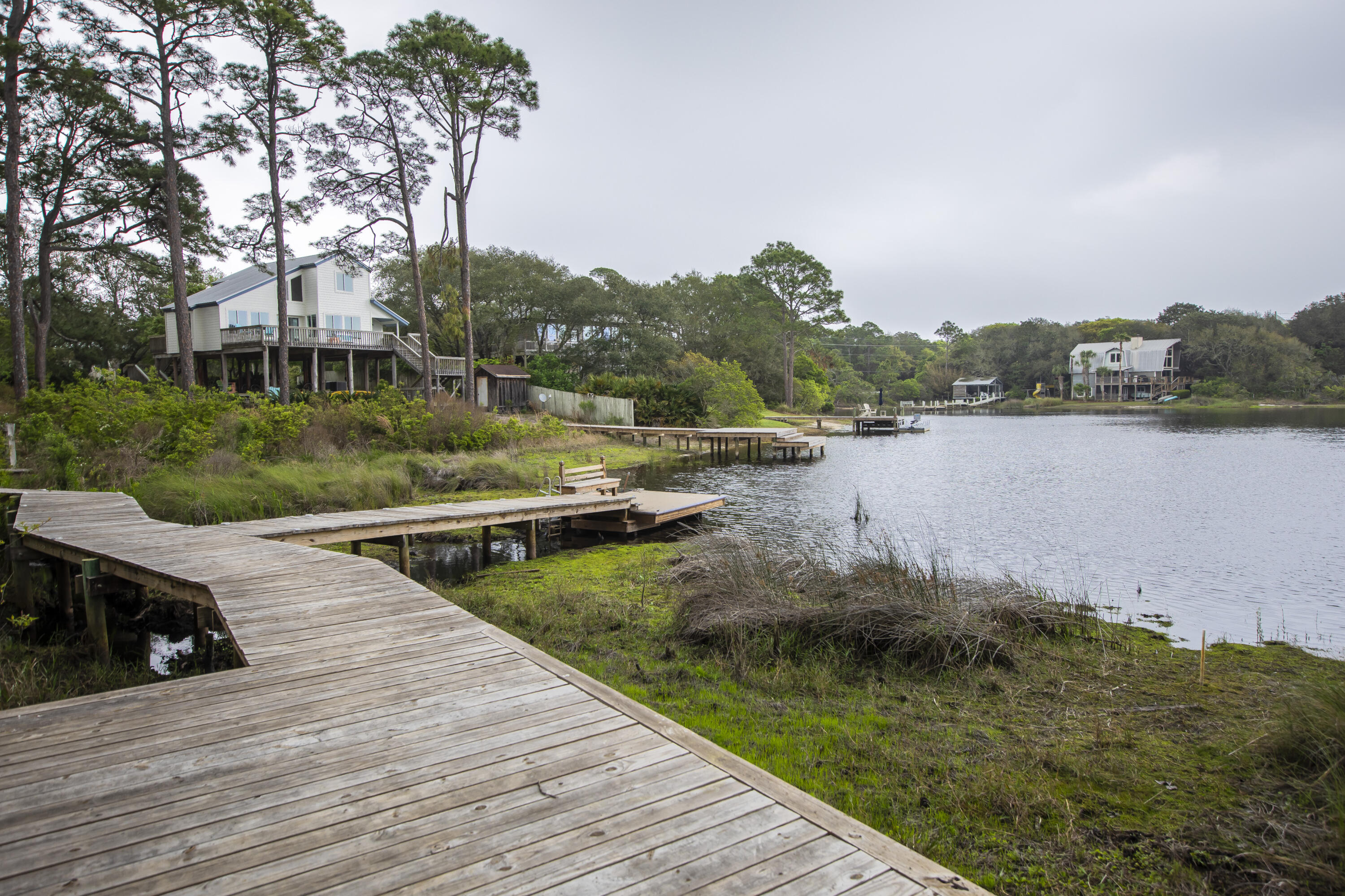 51 Loon Lake Drive Santa Rosa Beach, FL 32459 - Photo 45 of 49 a view of a lake with houses with outdoor space