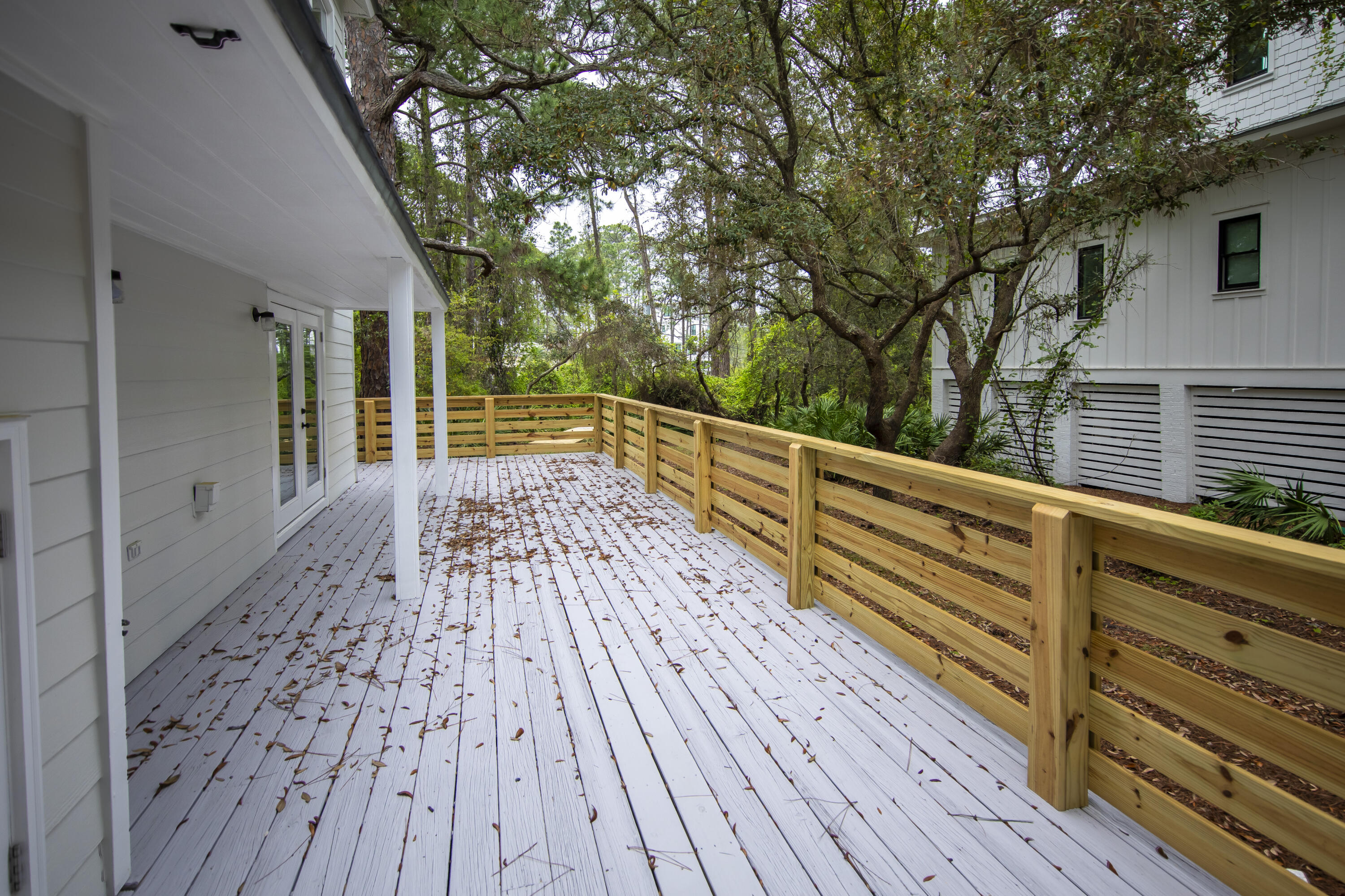 51 Loon Lake Drive Santa Rosa Beach, FL 32459 - Photo 10 of 49 a view of balcony with wooden floor and fence