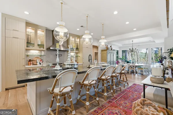 a view of a bathroom from a hallway