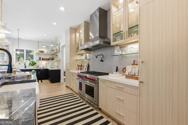 a bathroom with a toilet a sink and a mirror