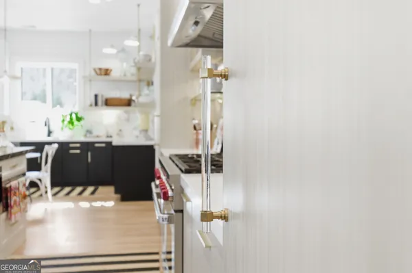 a en suite bathroom with a sink and mirror