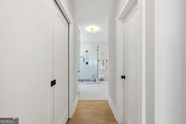 a living room with furniture pool table and flat screen tv