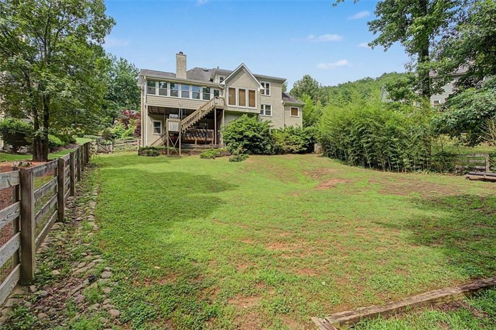 4510 North Slope Circle Marietta, GA 30066 - Photo 32 of 37 a front view of a house with a yard