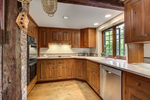 30 Oak Hill Road Harvard, MA 01451 - Photo 18 of 30 a kitchen with a sink window and cabinets