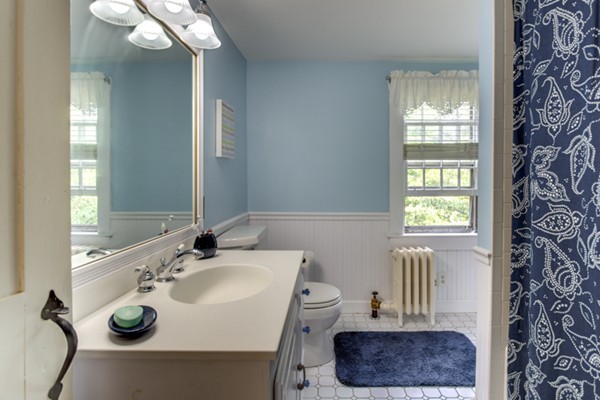 30 Oak Hill Road Harvard, MA 01451 - Photo 28 of 30 a bathroom with a sink and a mirror