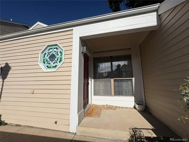 a view of a door and a window