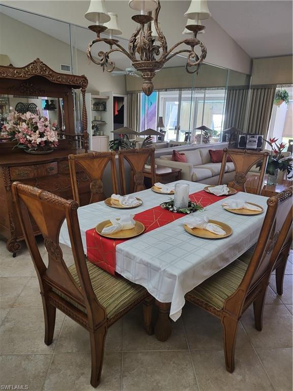 843 Marblehead Drive, Unit I3 Naples, FL 34104 - Photo 12 of 35 a view of a dining room with furniture