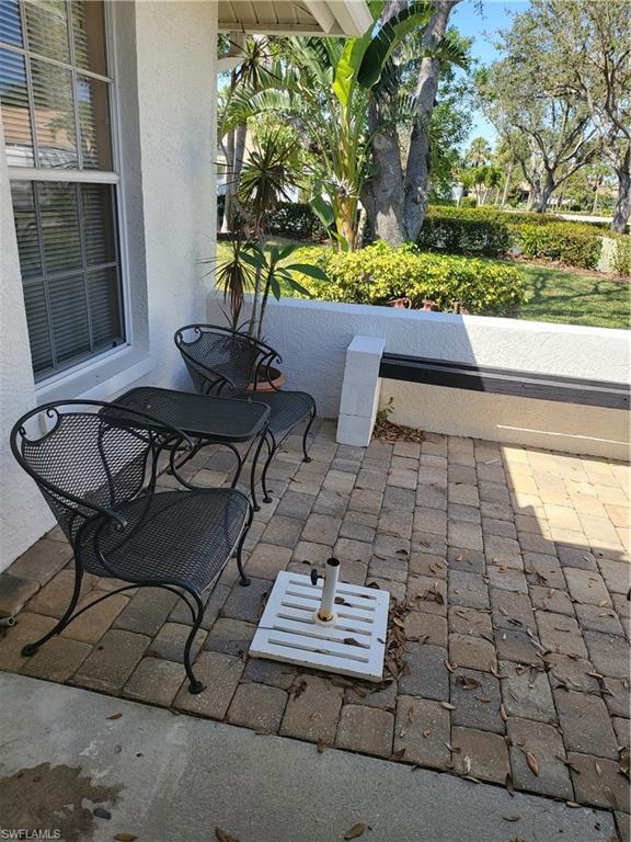 843 Marblehead Drive, Unit I3 Naples, FL 34104 - Photo 34 of 35 a view of outdoor space yard and patio