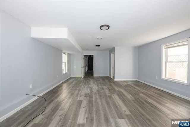 an empty room with a natural light