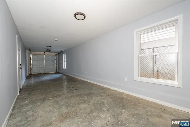 an outdoor space with wooden fence