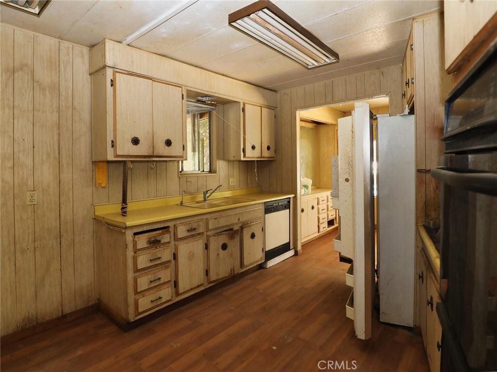3701 Risher Drive Clearlake, CA 95422 - Photo 7 of 15 a kitchen with stainless steel appliances granite countertop a refrigerator and a stove