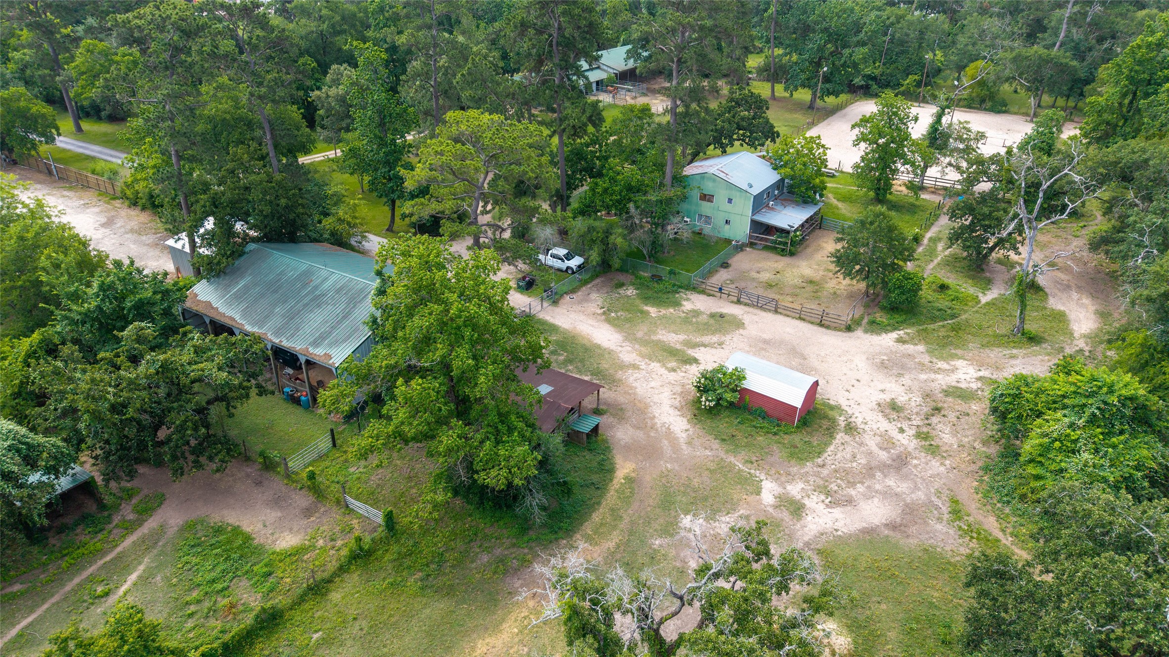 12625 Huffmeister Road Cypress, TX 77429 - Photo 12 of 35 an aerial view of a house with a yard and lake view
