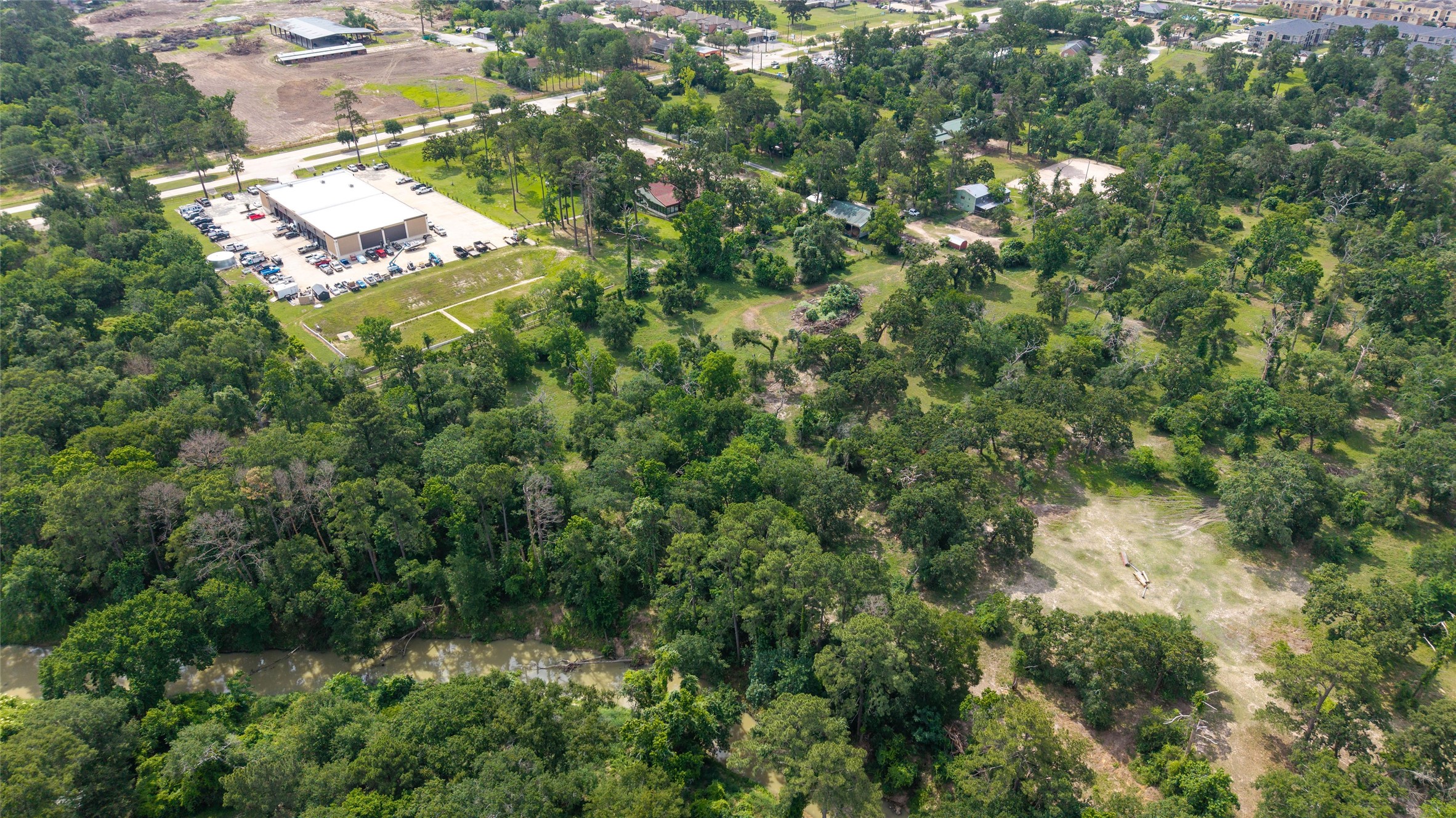 12625 Huffmeister Road Cypress, TX 77429 - Photo 26 of 35 an aerial view of residential house with outdoor space and trees all around