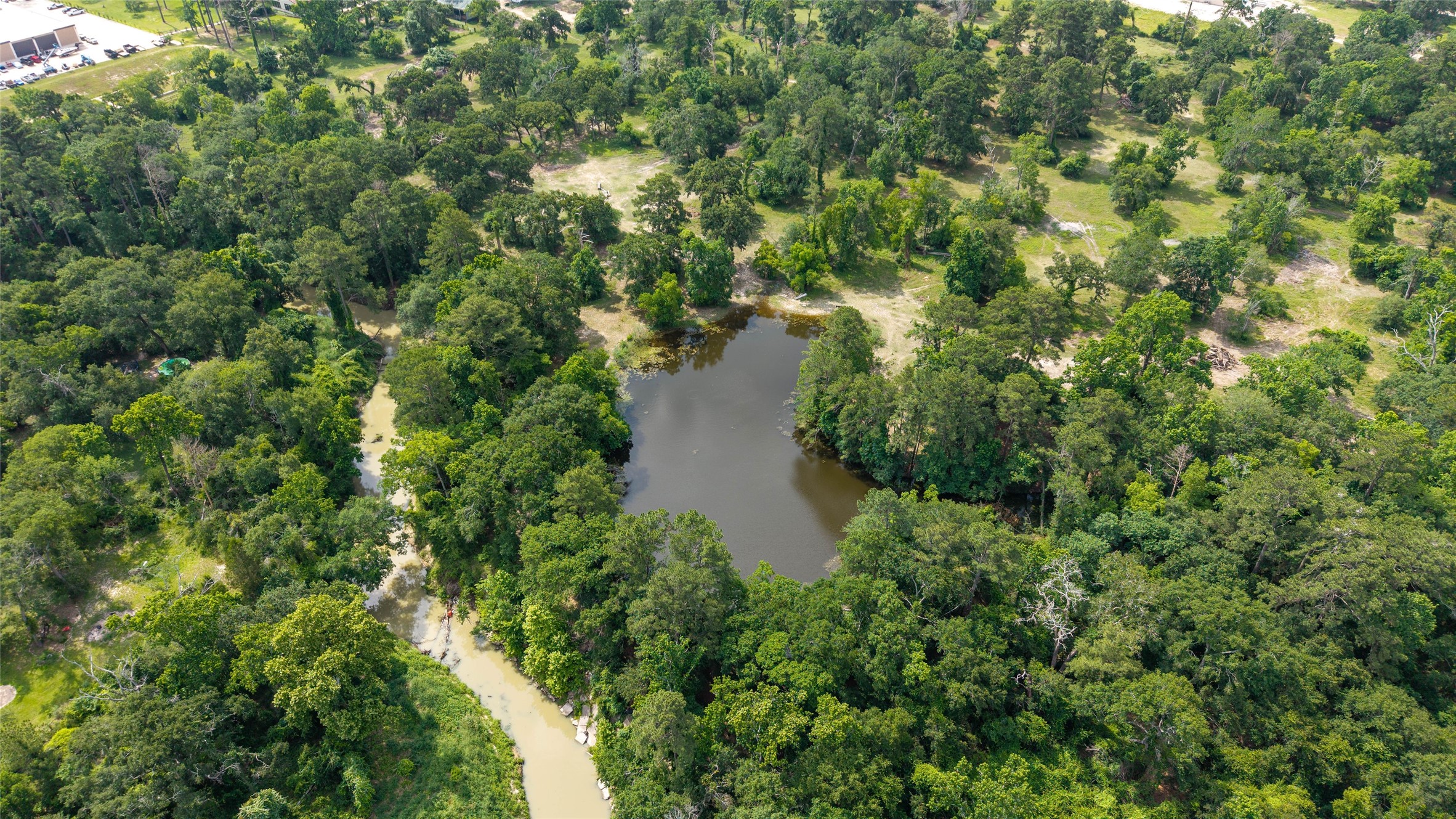 12625 Huffmeister Road Cypress, TX 77429 - Photo 27 of 35 an aerial view of residential house with outdoor space and trees all around