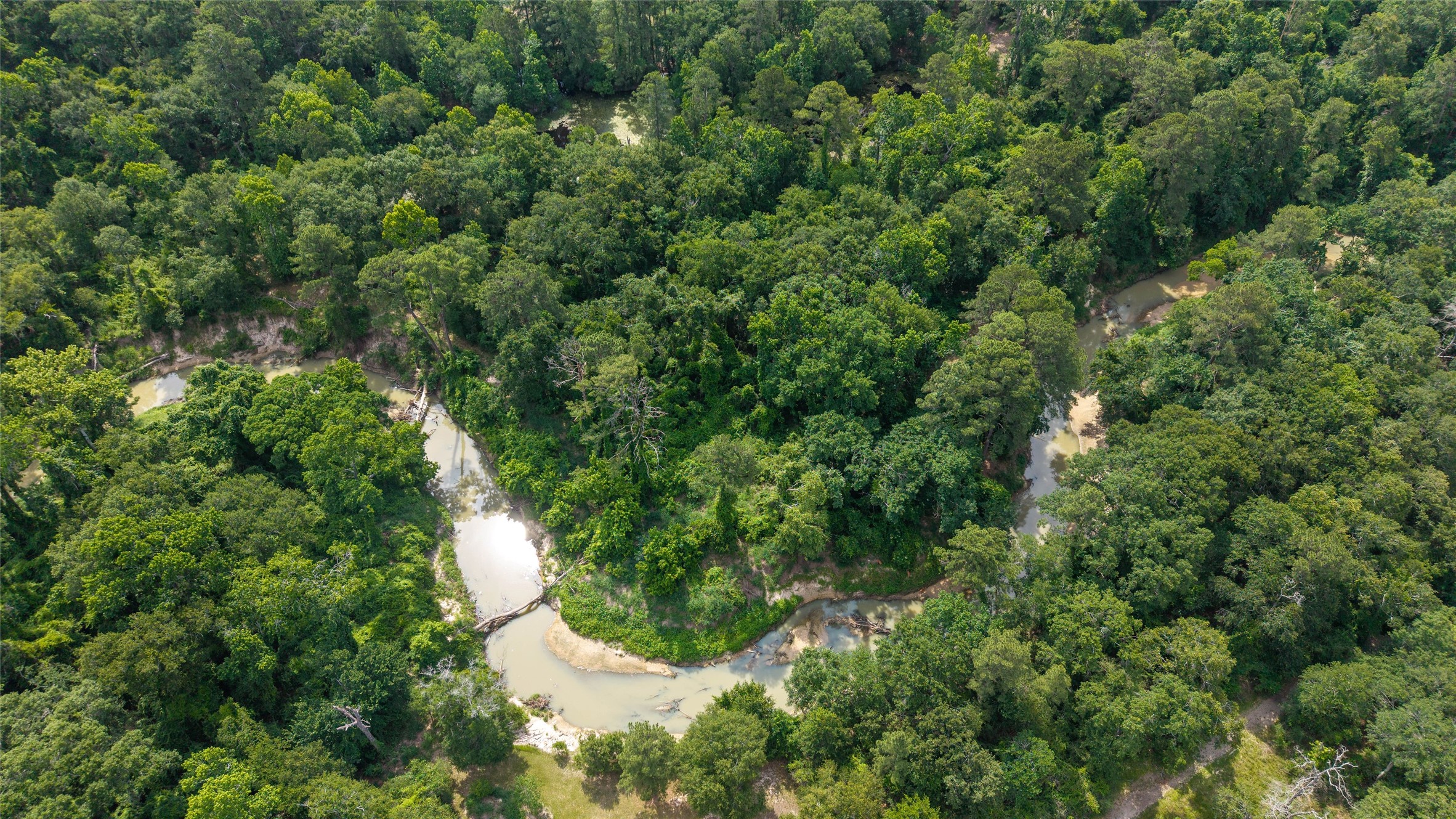 12625 Huffmeister Road Cypress, TX 77429 - Photo 29 of 35 an aerial view of residential house with outdoor space and trees all around