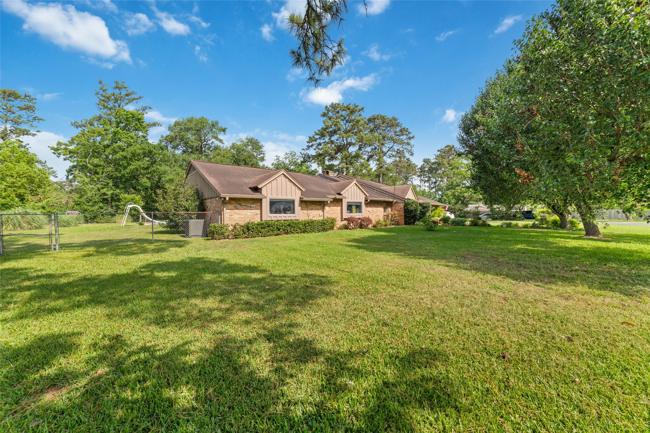 12625 Huffmeister Road Cypress, TX 77429 - Photo 6 of 35 a house view with a garden space