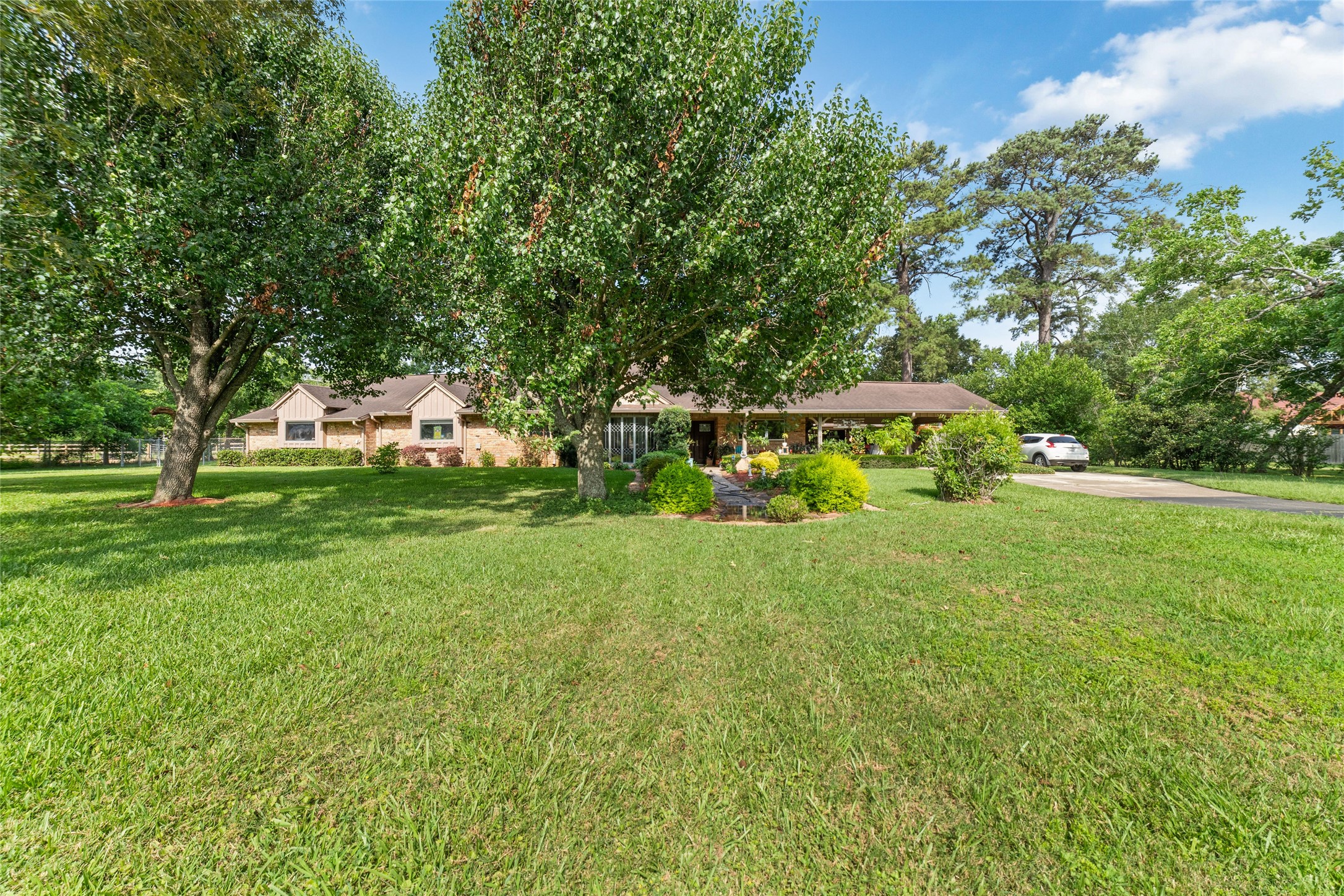 12625 Huffmeister Road Cypress, TX 77429 - Photo 7 of 35 a view of a park with large trees