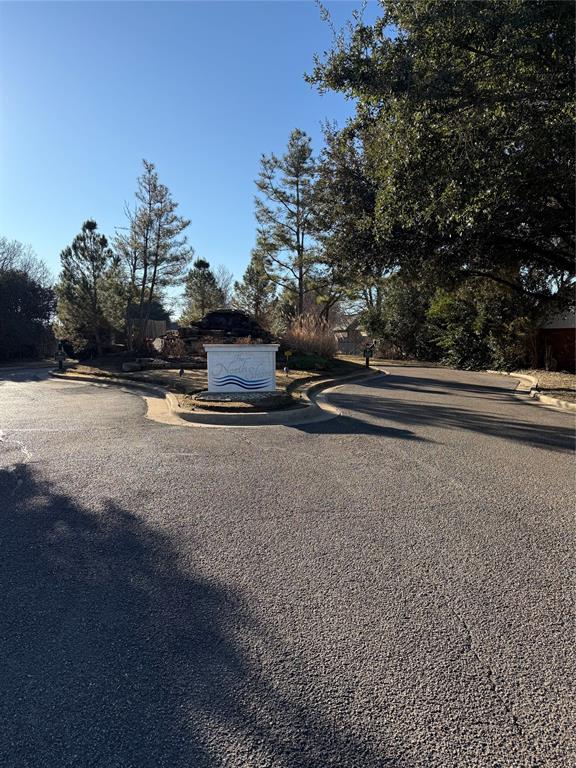 29 North Shore Circle Waco, TX 76708 - Photo 4 of 20 a view of outdoor space with trees