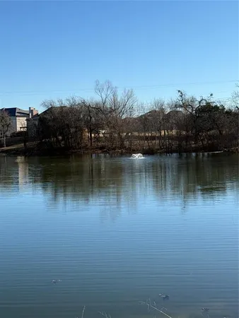 a view of a lake with houses