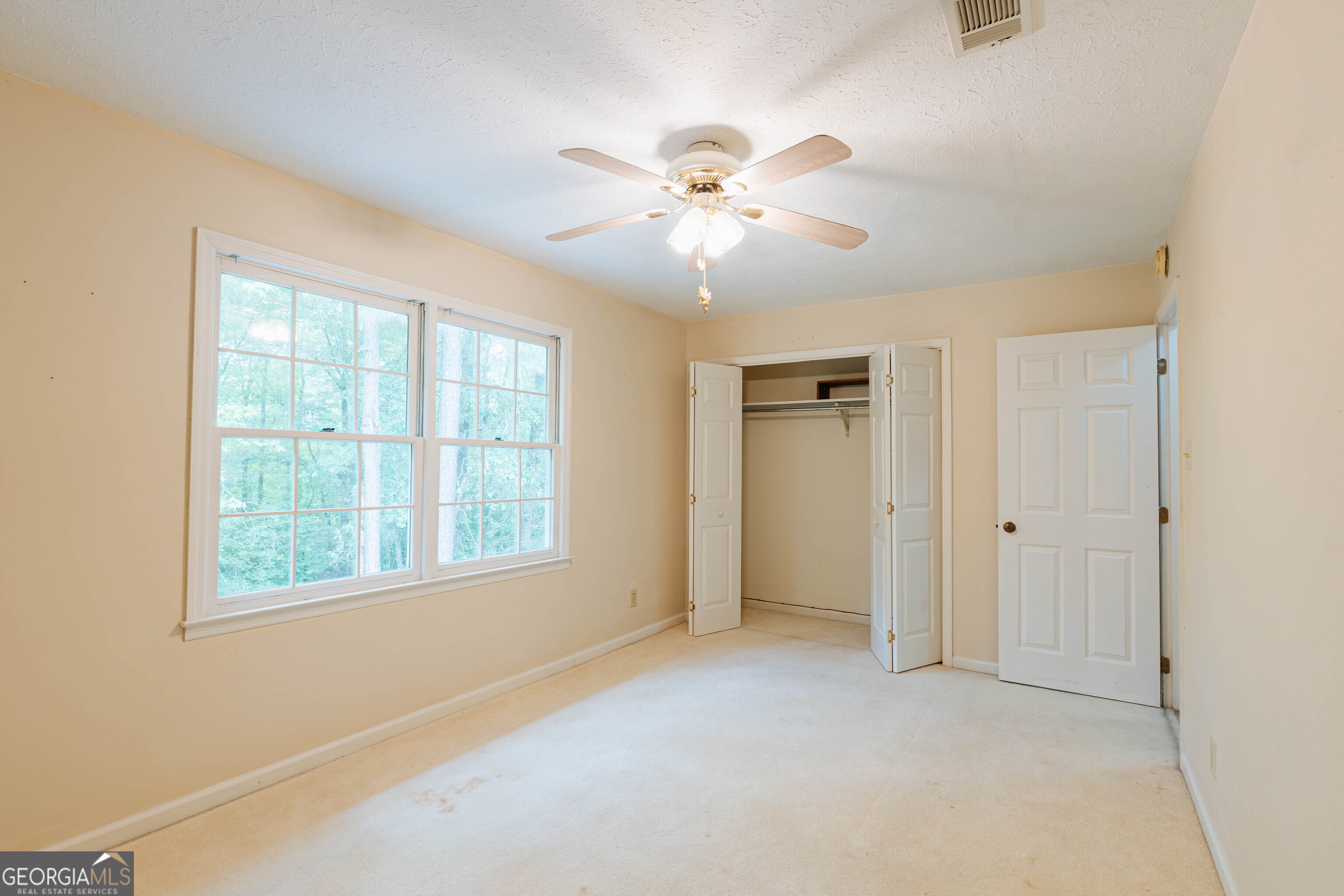 139 Cords Bridge Road Northeast Milledgeville, GA 31061 - Photo 28 of 35 a view of an empty room with a window