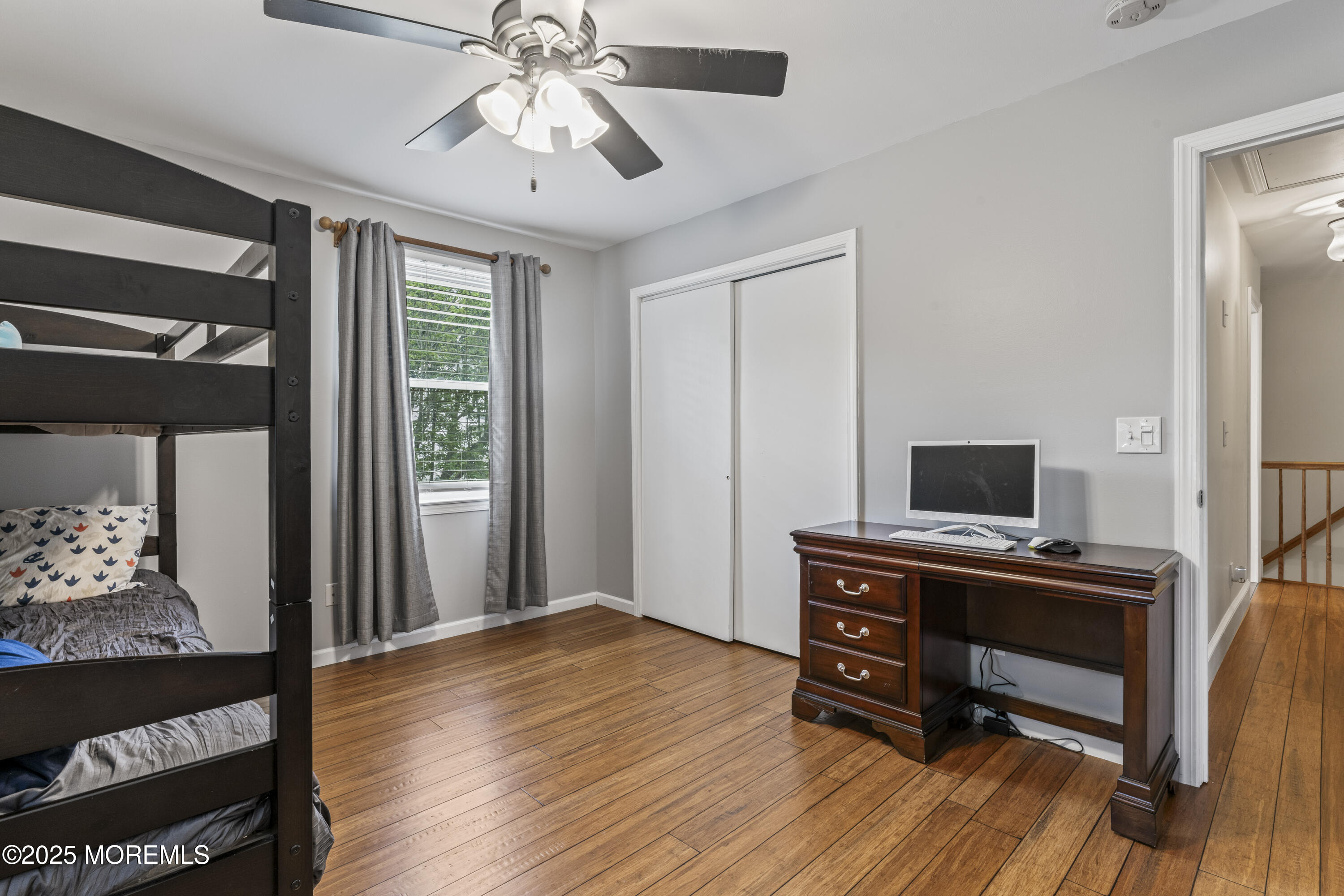 5 Windsor Court Hazlet, NJ 07730 - Photo 22 of 38 a view of a workspace with furniture and a window