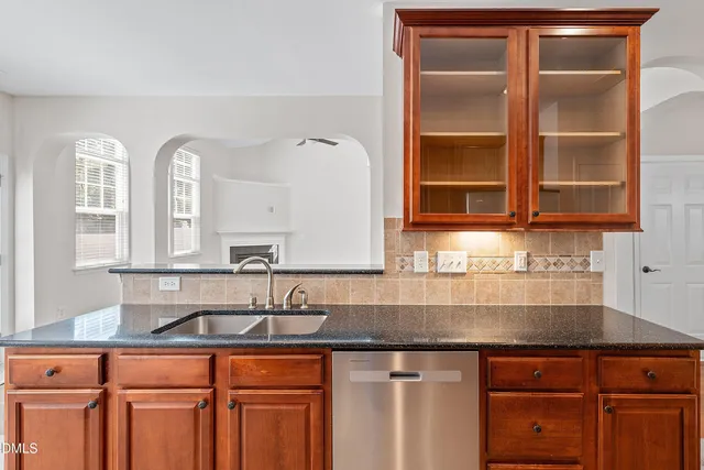 a view of a double vanity sink and a mirror