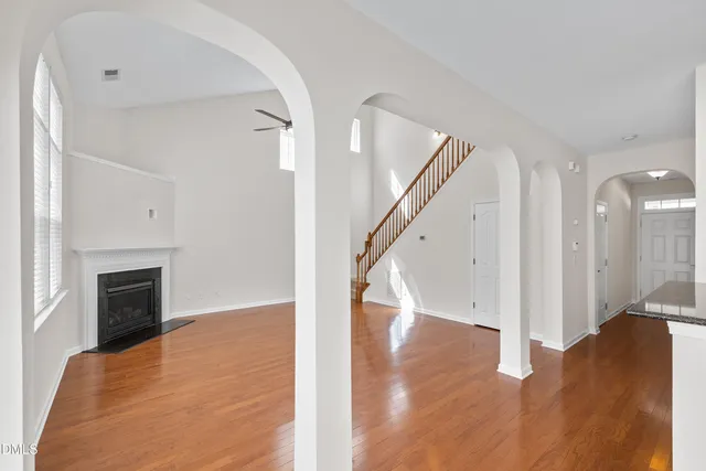 a view of kitchen with stainless steel appliances kitchen island microwave and stove