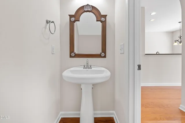 a view of an entryway with wooden floor
