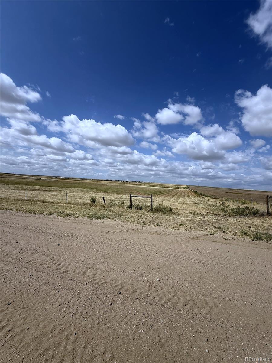 14771 North Harback Road Keenesburg, CO 80643 - Photo 3 of 6 a view of an outdoor space and mountain view