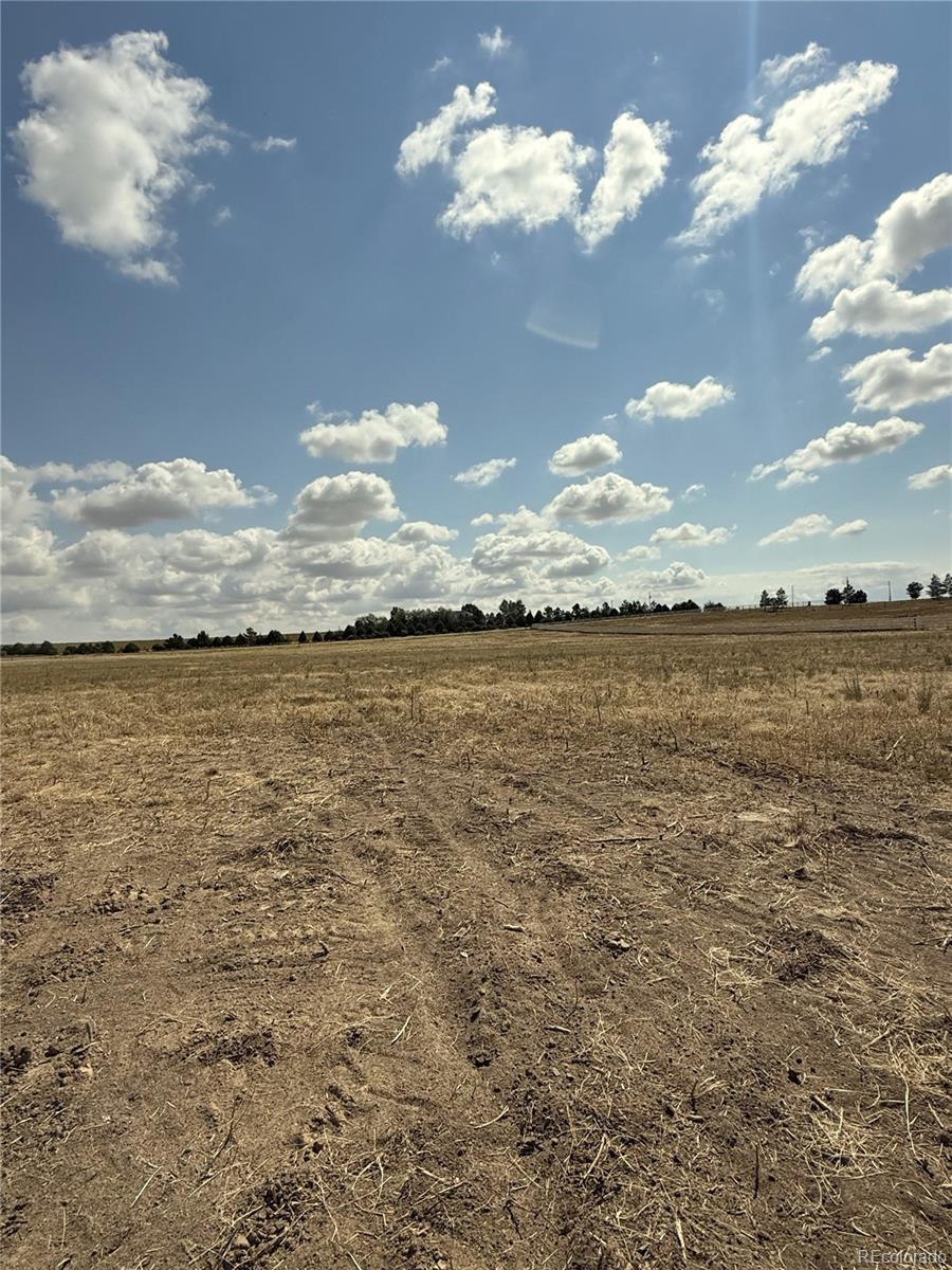 14771 North Harback Road Keenesburg, CO 80643 - Photo 5 of 6 a view of a lake