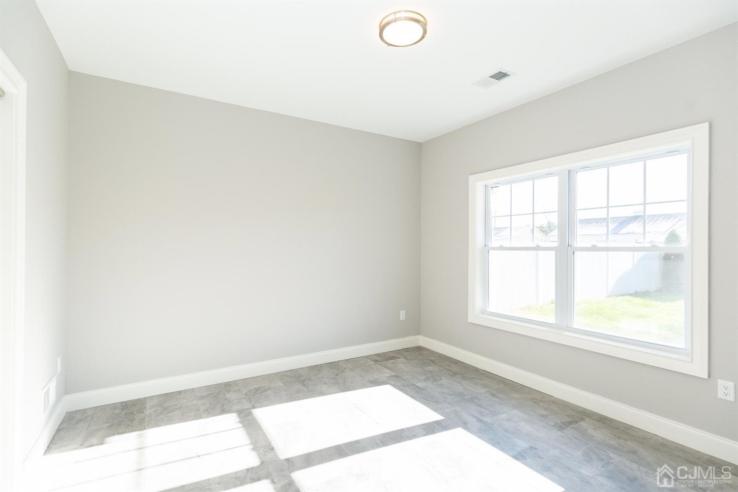20 Winthrop Road Edison, NJ 08817 - Photo 16 of 55 a view of an empty room and window