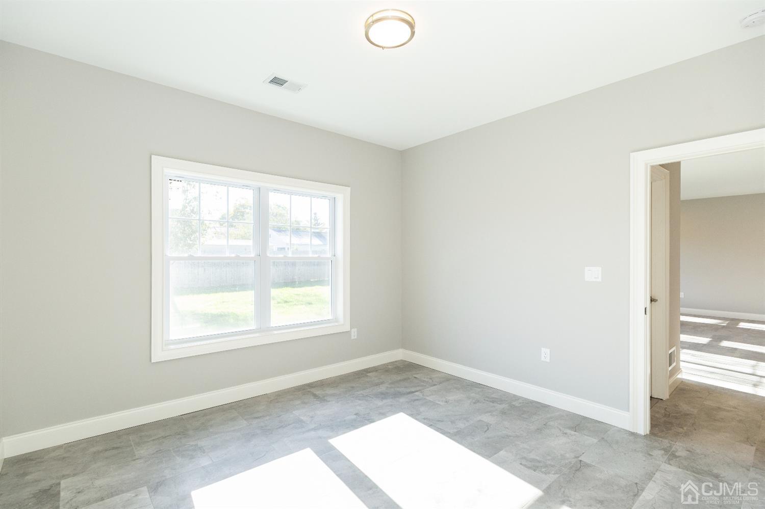 20 Winthrop Road Edison, NJ 08817 - Photo 19 of 55 an empty room with windows