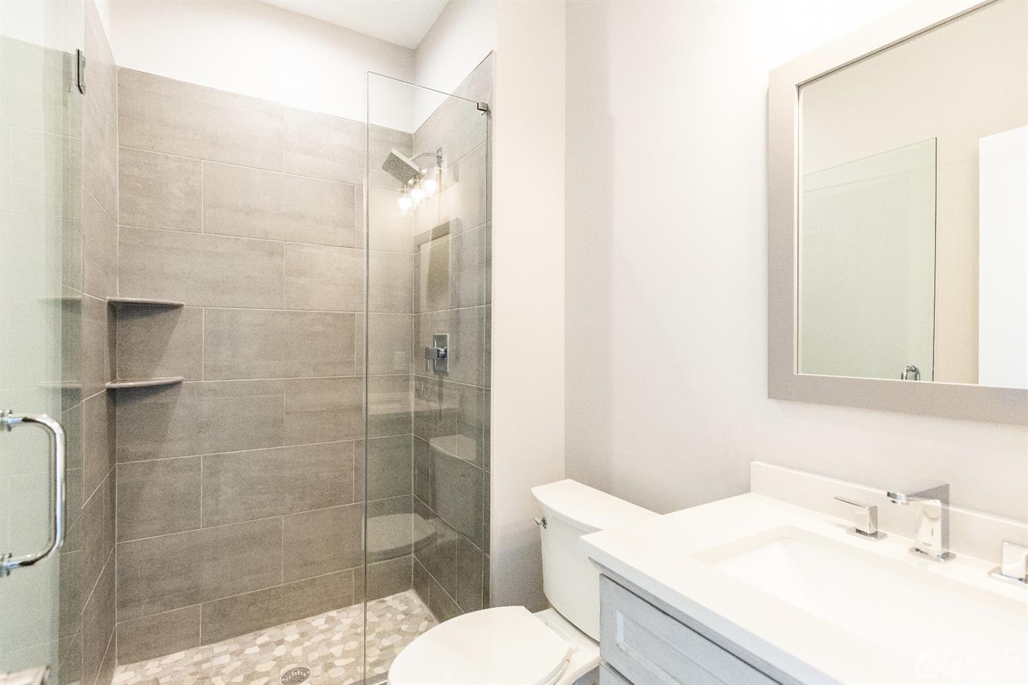 20 Winthrop Road Edison, NJ 08817 - Photo 20 of 55 a bathroom with a sink toilet and shower