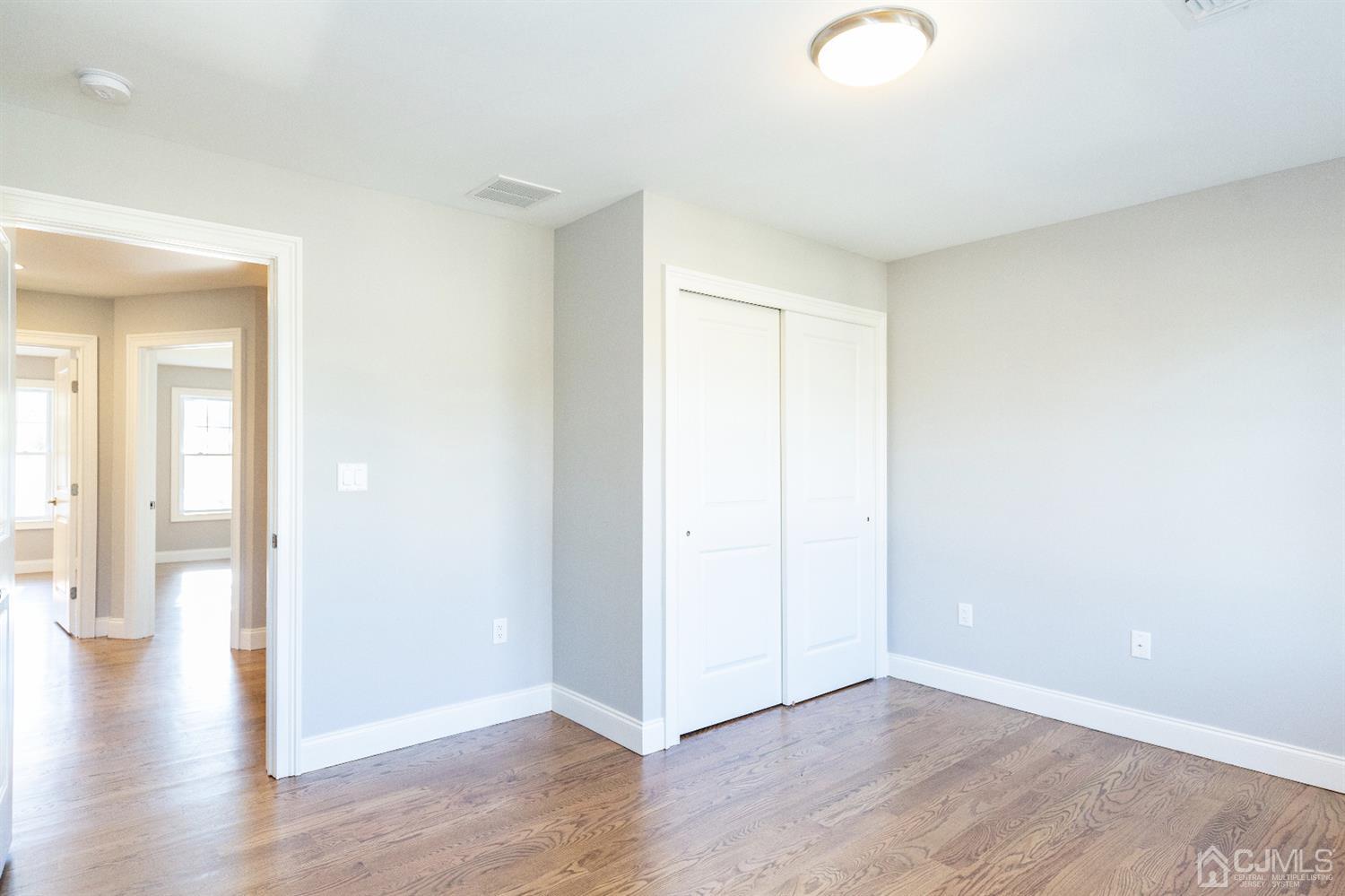 20 Winthrop Road Edison, NJ 08817 - Photo 24 of 55 a view of an empty room with wooden floor