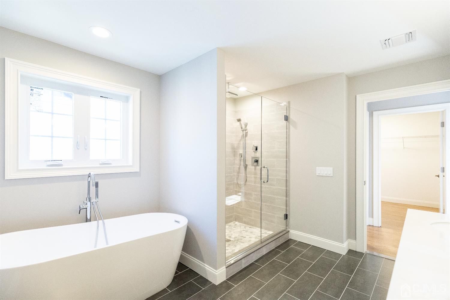 20 Winthrop Road Edison, NJ 08817 - Photo 45 of 55 a bathroom with a bathtub and a shower