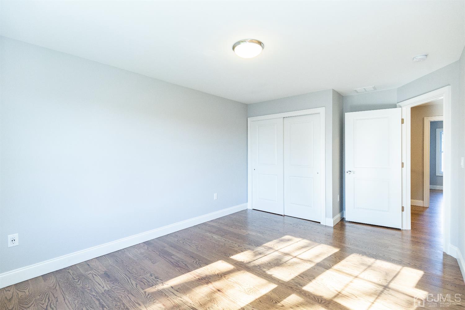 20 Winthrop Road Edison, NJ 08817 - Photo 48 of 55 a view of a room with wooden floor and bedroom